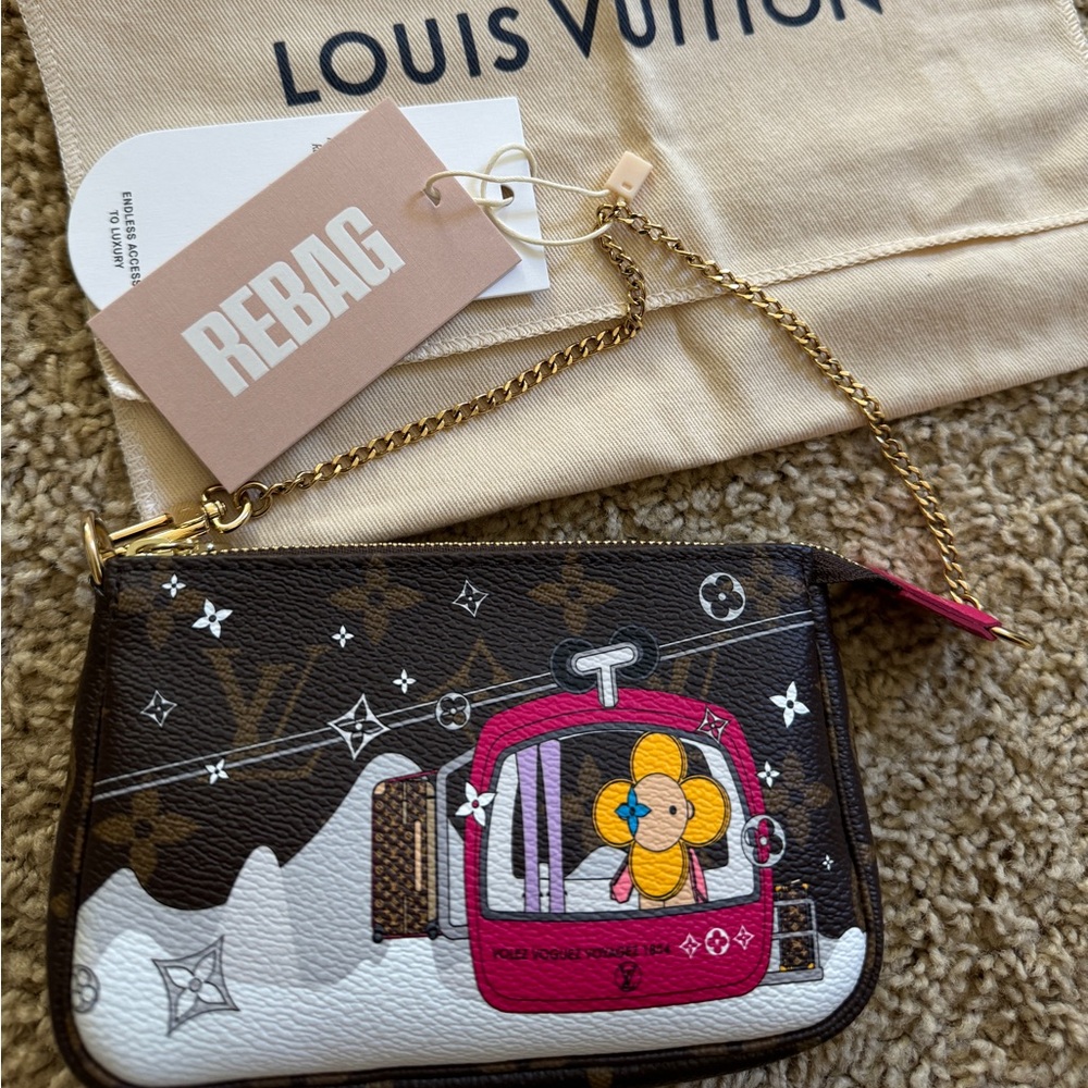 Authentic 💯 Louis Vuitton Mini Pochette